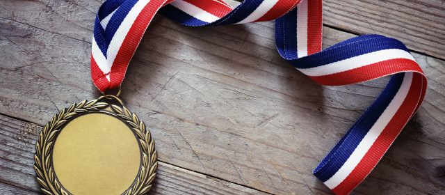 Nagrody za osiągnięcia sportowe – jaką pełnią rolę i dlaczego warto je wręczać?